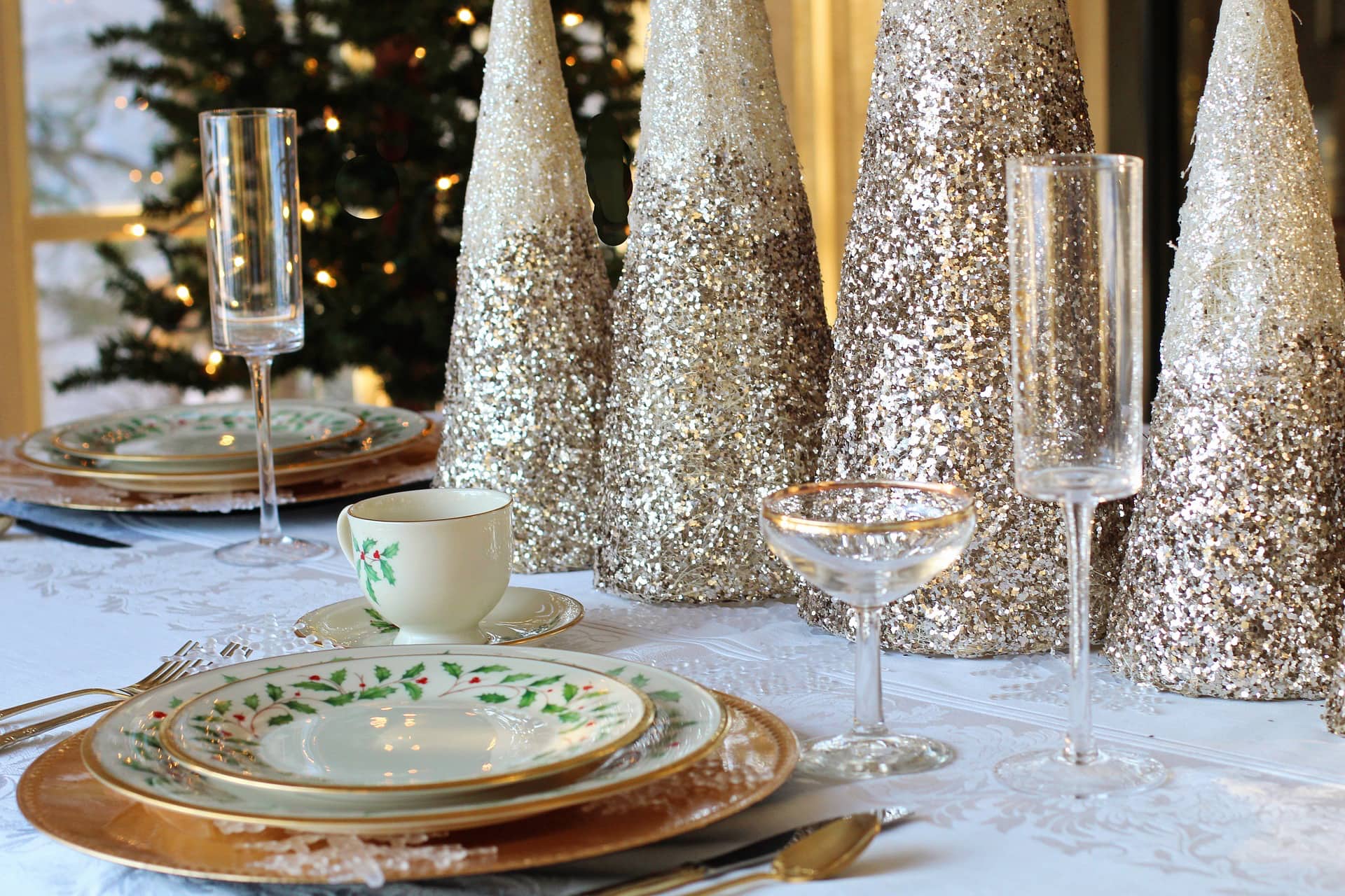 a festive table set for christmas dinner.