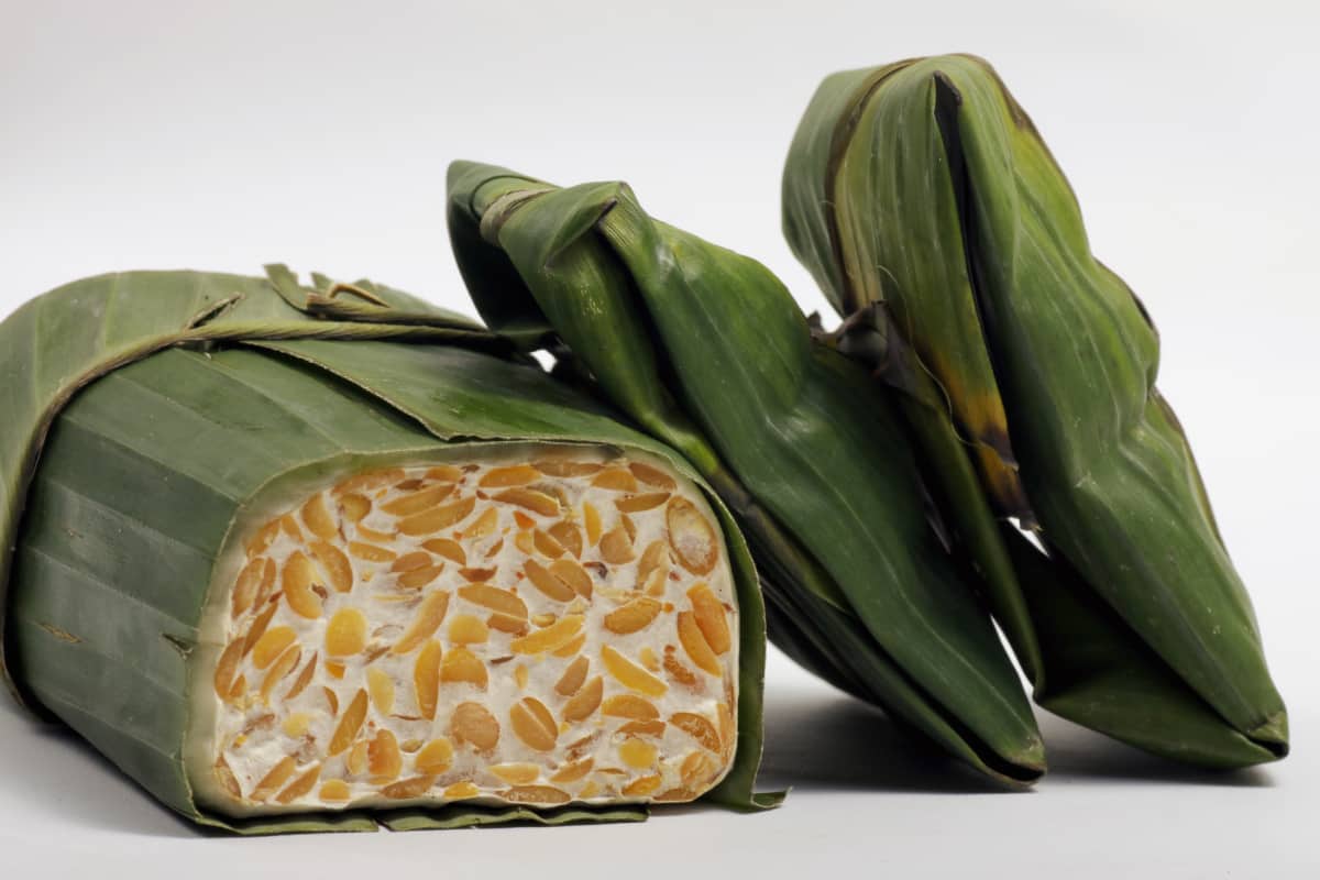 indonesian tempeh wrapped in a banana leaf.