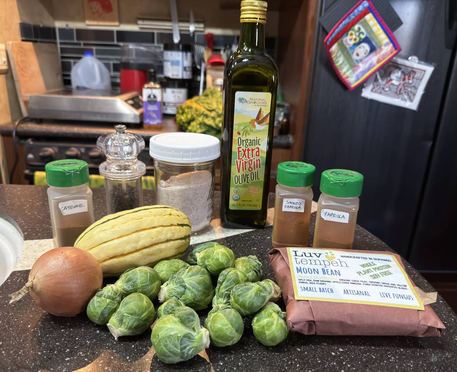 ingredients for tempeh delicata squash recipe on a kitchen counter.
