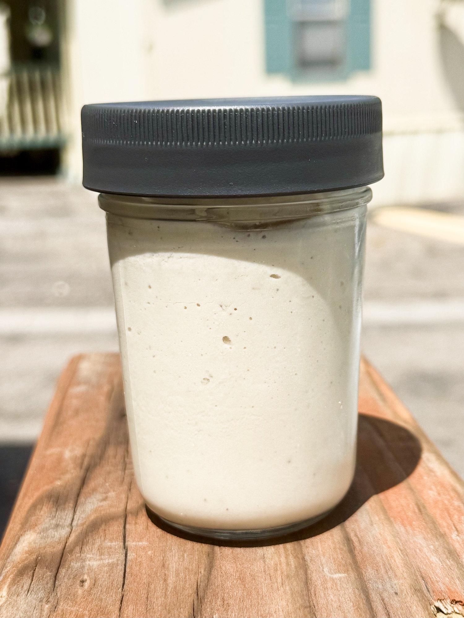 sweet-tahini-miso-dressing-jar sweet miso tahini dressing in a jar.